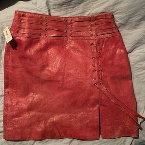NWT BARAMI 100% leather mini skirt with a cinched front slit size 6 lipstick red